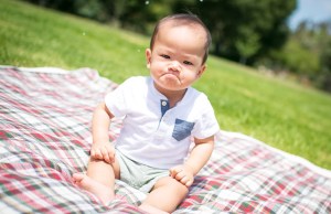 Upset baby on blanket