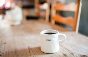 white mug on wood table