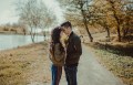 Couple holding hands in park