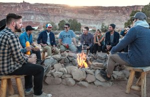 group of people in front of bonfire