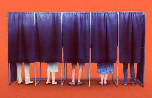 orange background with 5 black curtain stalls with feet