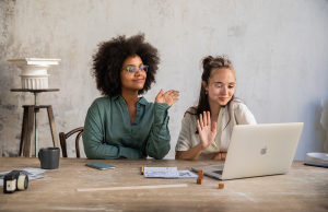 two-women-meeting-virtually-on-laptop