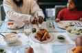 woman-in-white-long-sleeve-shirt-holding-stainless-steel-fork