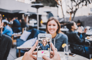 person-taking-photo-of-woman