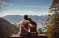 Couple embracing at a viewpoint