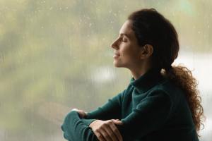 Woman sitting at a window