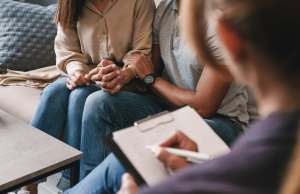 Couple sitting together in a counseling session